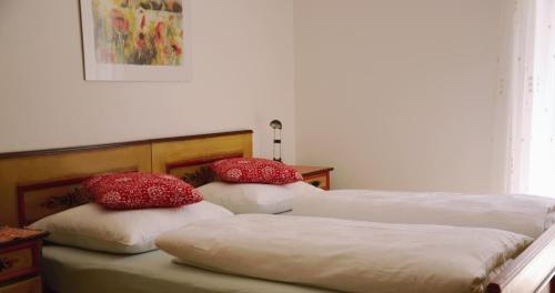 Un ou plusieurs lits dans un hébergement de l'établissement Apartment Turmblick