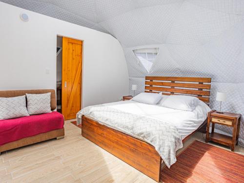 Postel nebo postele na pokoji v ubytování Hacienda Maimará