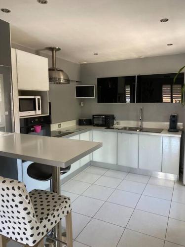 Appartement en haut de villa.