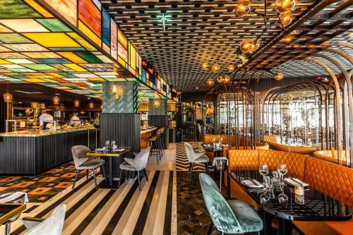 Een restaurant of ander eetgelegenheid bij Apollo Hotel Amsterdam, a Tribute Portfolio Hotel