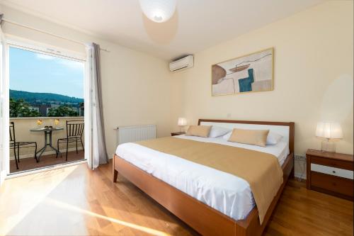 Posteľ alebo postele v izbe v ubytovaní Cozy Vila Summer-Perfect Location