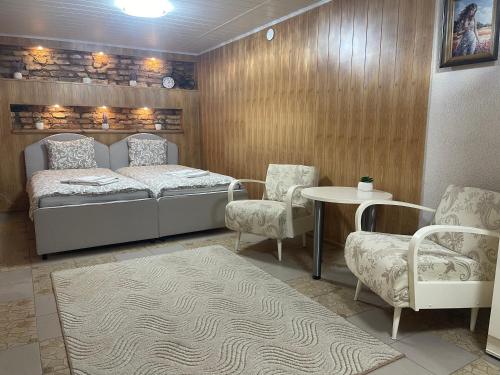 Кровать или кровати в номере Guest House Vilnius