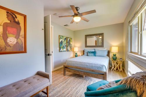a bedroom with a bed and a couch at Luxe Maunalani Resort Condo with Pool and Beach Access in Waikoloa