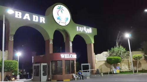 a restaurant with a clock on top of a building at قريه بدر كيلو 82 الساحل الشمالي in El Alamein