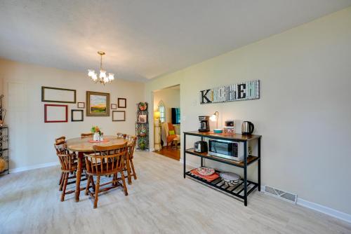 a kitchen and dining room with a table and chairs at Quiet Somerset Retreat - Near Lake Cumberland in Somerset