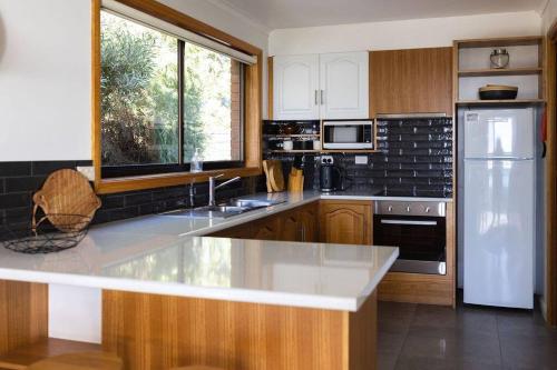 Dapur atau dapur kecil di Beach Break - Diamond Island