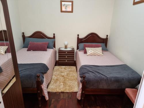 Кровать или кровати в номере Cozy Pilar House 19