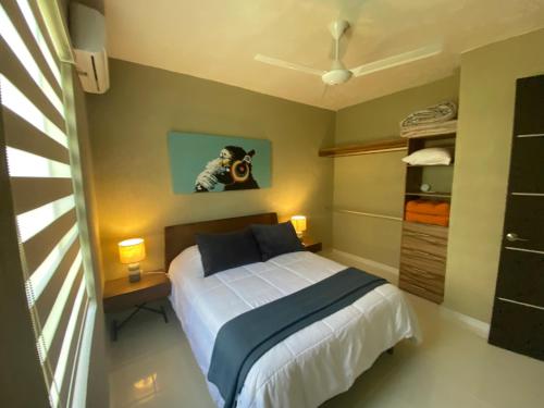 Ένα ή περισσότερα κρεβάτια σε δωμάτιο στο Tangerine Tulum House: Pools, Zamna, Wi-Fi, Cenote