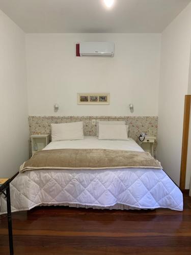 Ένα ή περισσότερα κρεβάτια σε δωμάτιο στο Hotel e Spa Provençal