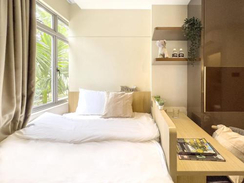 Postel nebo postele na pokoji v ubytování Coliwoo Orchard - CoLiving