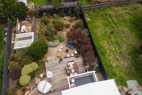 an aerial view of a backyard with a garden at Blue Bay View Surf & Sauna Stay in Surf Beach
