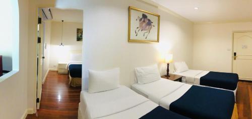 Katil atau katil-katil dalam bilik di The Victory Residences Bangkok