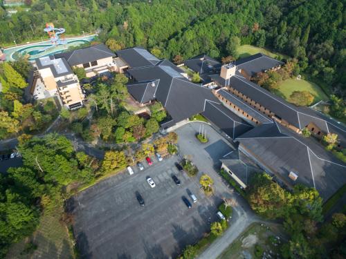 an overhead view of a building with a parking lot at Sennomori in Ise
