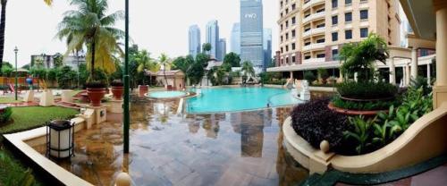 a large pool in the middle of a building at apartemen in Jakarta