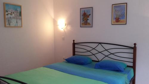 Ένα ή περισσότερα κρεβάτια σε δωμάτιο στο Apartments Ručna