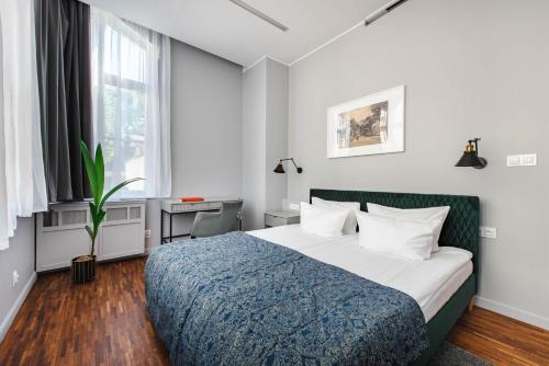 Postel nebo postele na pokoji v ubytování By Monte Apartment