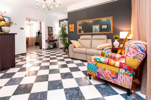 a living room with a checkered floor at Villa B&B Marina & Parking Free in Rovinj