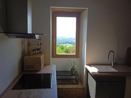 Φωτογραφία από το άλμπουμ του Maison en pierres avec vue sur la Dordogne σε Marnac