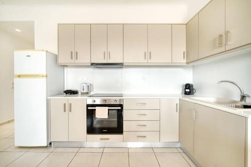 Η κουζίνα ή μικρή κουζίνα στο Overview Mykonos Apartments