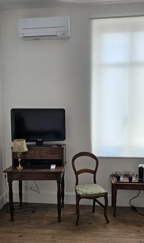 TV a/nebo společenská místnost v ubytování Chez Mag