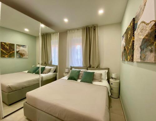A bed or beds in a room at Le Suite con terrazzo Abitare Roma