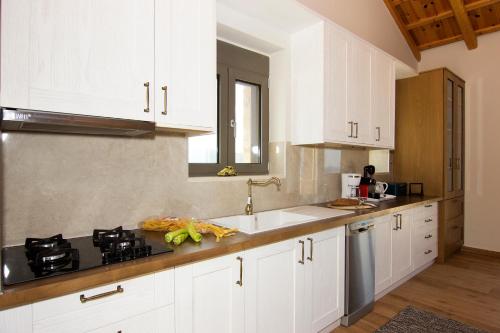 Una cocina o cocineta en Kika Residences