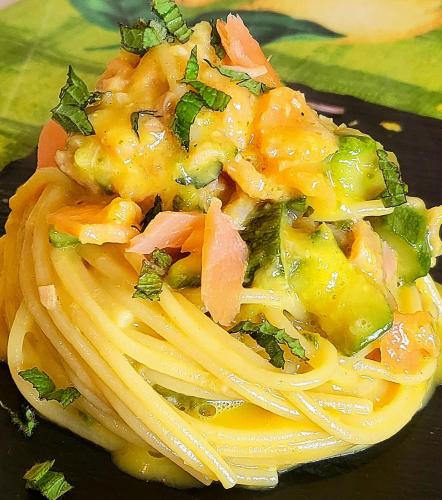 a plate of pasta with meat and vegetables on it at Hotel La Baia in Ponza