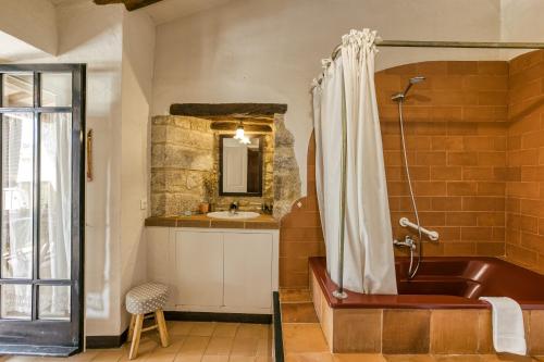 Kylpyhuone majoituspaikassa El Rebost de Can Gat Vell