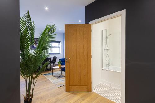 a door leading into a room with a dining room at At the level - (2 bed flat) in Brighton & Hove