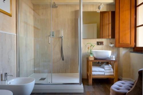 a bathroom with a shower and a sink at Mabelle Firenze Residenza Sassetti in Florence