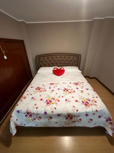 Säng eller sängar i ett rum på La Casetta Guest House