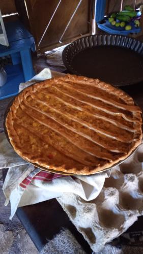 a large pie sitting on top of a table at 4 Pohon - Les 4 Arbres in Pandang