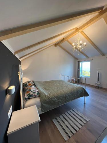 a bedroom with a bed in a room at Apartment and Studio Ivan Dolac in Ivan Dolac