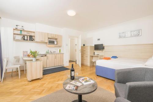 Kuchyň nebo kuchyňský kout v ubytování Appartements Ferchergasse
