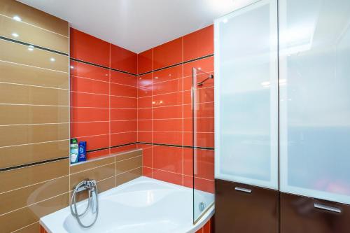 a bathroom with a shower and a tub at Artemisia Sunset View in Sitia