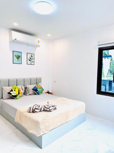 Postel nebo postele na pokoji v ubytování Avita Pool Villa