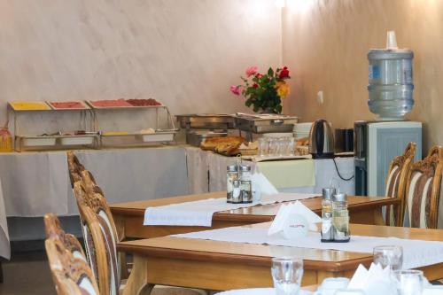 Køkken eller tekøkken på Jupiter 1 Family Hotel