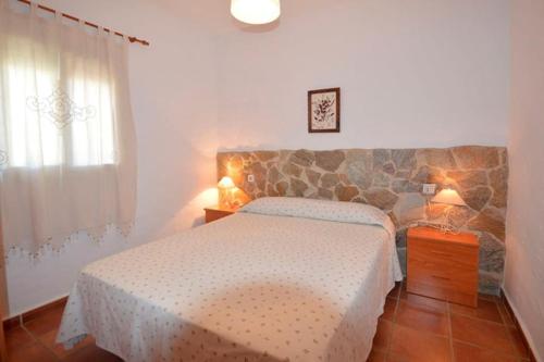 Postel nebo postele na pokoji v ubytování Casas Paqui y Pablo con piscina compartida en Conil