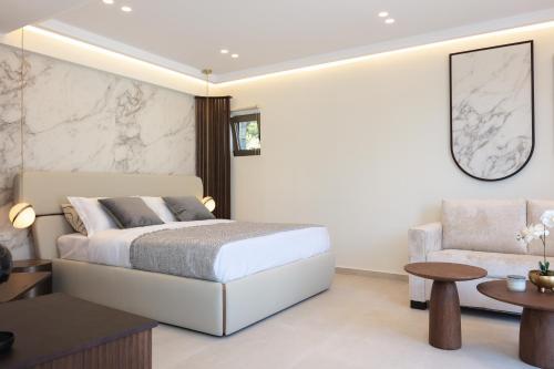 Ένα ή περισσότερα κρεβάτια σε δωμάτιο στο Naiades Boutique Hotel - Adults Only