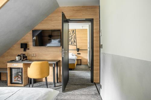 TV a/nebo společenská místnost v ubytování Amenity Hotel & Resort Orlické hory