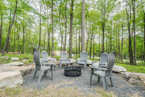 a group of chairs sitting around a fire pit at Hearthstone in McHenry