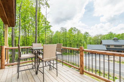 a patio with chairs and a table on a deck at Hearthstone in McHenry