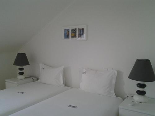 Postel nebo postele na pokoji v ubytování Sincerely Lisboa