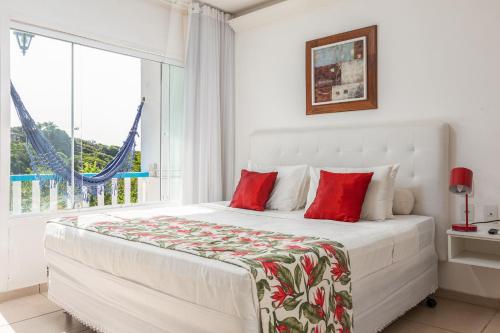 Postel nebo postele na pokoji v ubytování Hotel Miratlantico Búzios