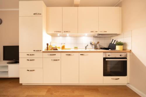 Kuchyň nebo kuchyňský kout v ubytování CNSa3-11 - 2-Raum Appartement