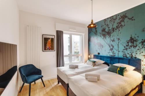 Postel nebo postele na pokoji v ubytování Le Panoramique - Appartement de standing