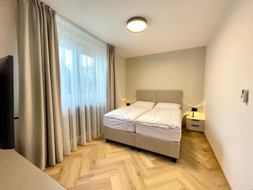 Giường trong phòng chung tại Villa Bea