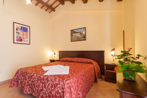 Casa Vacanze S. Marco tesisinde bir odada yatak veya yataklar