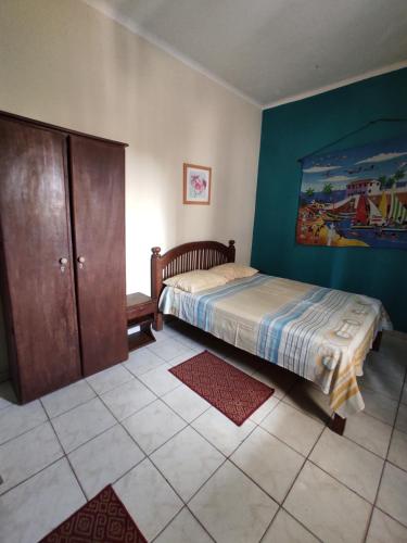 En eller flere senge i et værelse på Grande Apto. equipado no Porto Barra