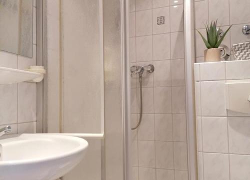 Koupelna v ubytování Haus Südwind Herzmuschel - klein aber fein